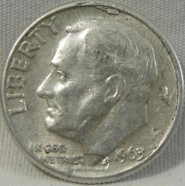 Roosevelt-Dime,-With-Cud-And-Possible-Lamination?